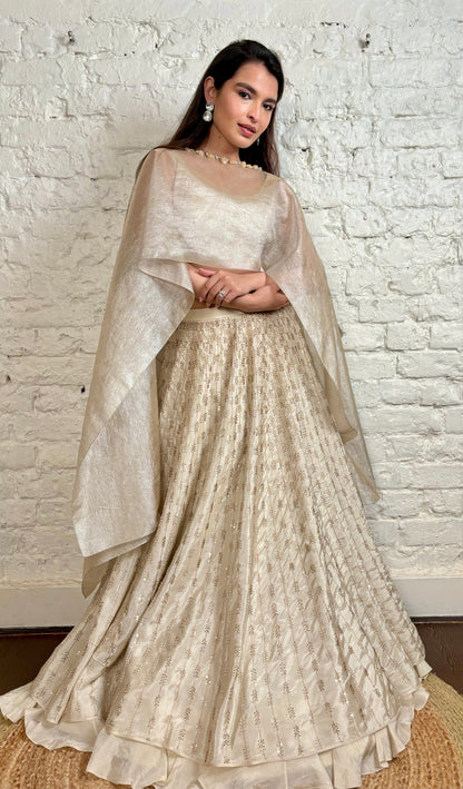 Ivory tissue glasspipe and pearl lehenga cape set