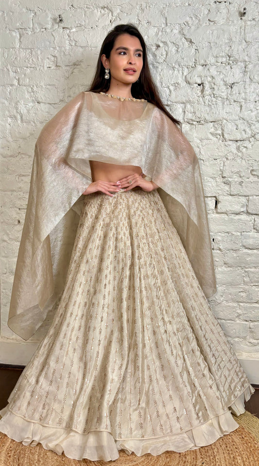 Ivory tissue glasspipe and pearl lehenga cape set