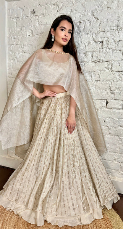 Ivory tissue glasspipe and pearl lehenga cape set